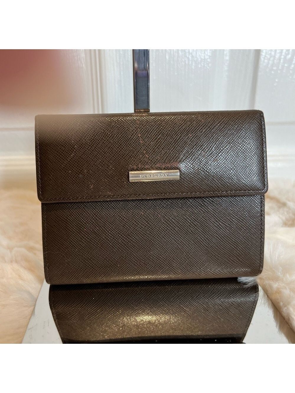 BURBERRY Tri fold brown wallet. Kisslock.